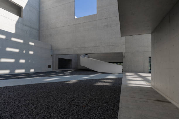 istock The cement walls and empty road of modern minimalist architecture 1785570708