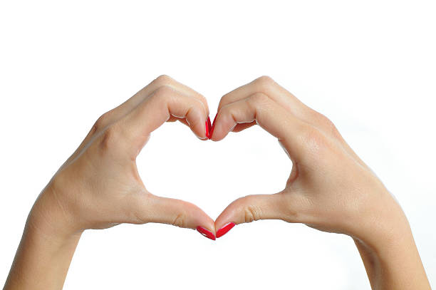 istock female hands showing heart shape on isolated background 178557334