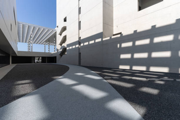 istock The light and shadow generated by sunlight on modern building walls 1785578296