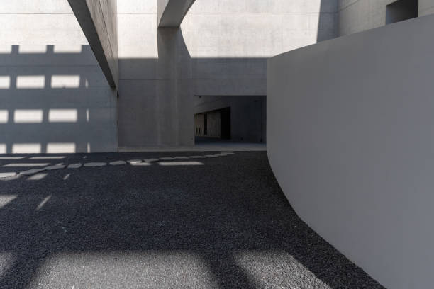 istock The cement walls and empty road of modern minimalist architecture 1785578869