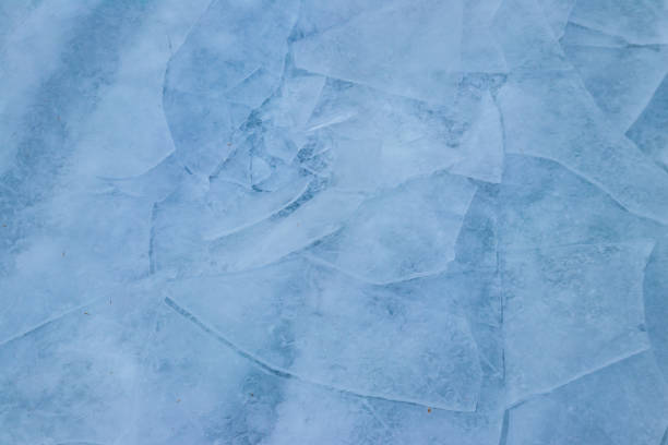 istock Texture of the cracked ice. Winter background 1785579491