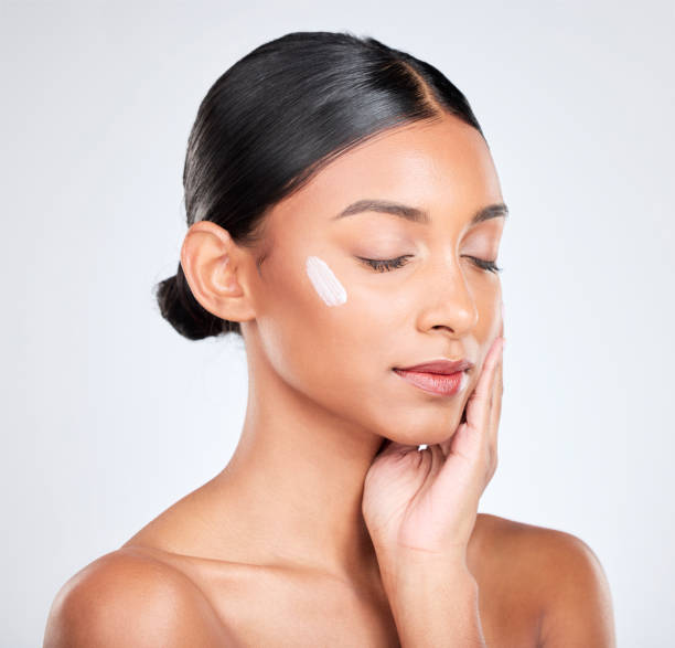 istock Shine, cream or woman with skincare, dermatology or wellness on a white studio background. Person, aesthetic or model with creme, moisturiser or luxury with self care, beauty or cosmetics with lotion 1785580607