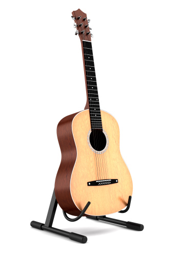 acoustic guitar on stand isolated on white background