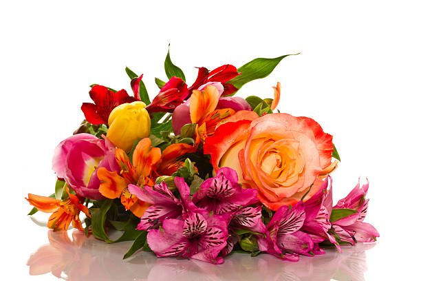 New Delhi, India - July 7, 2013.  An Indian man looks at the roses at the wholesale flower market.