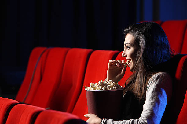 istock Woman at cinema 178559053