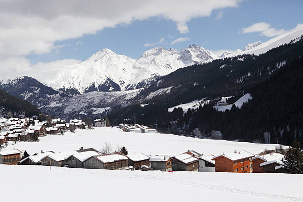 istock Small village under snow-covered peaks 178559180