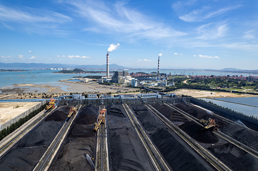 Aerial view of black coal stacked at the coal port