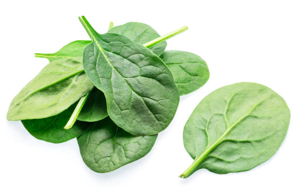 istock Green fresh spinach leaves isolated on white background. 1785604829