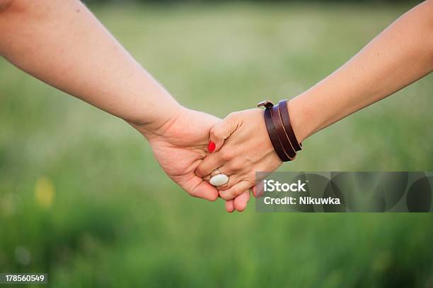 Couple Holding Hands Stock Photo - Download Image Now - Adult, Adults Only, Copy Space