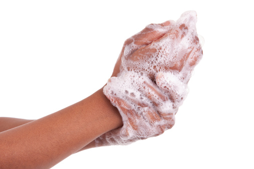 African American woman washing hands, isolated on white background