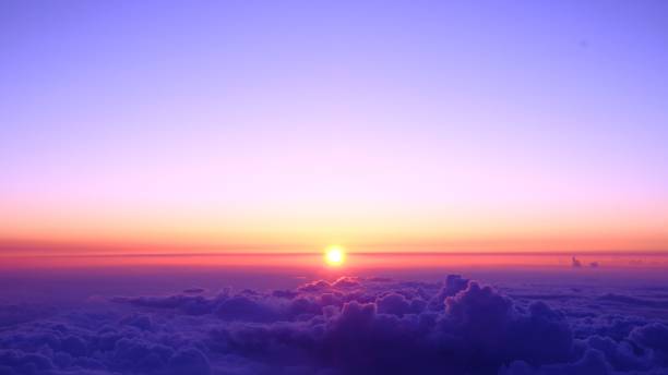 istock Scenic view of clouds painted in purple at sunset 1785620186