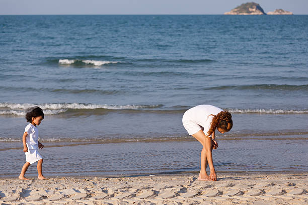 istock Asian mom and son on beach 178562215