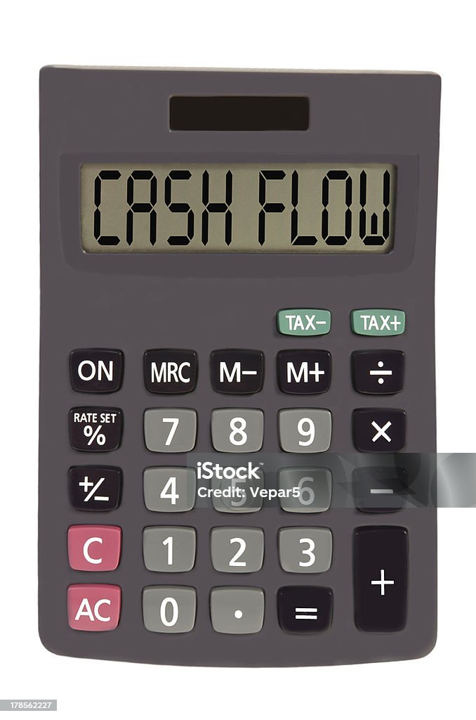 Calculateur de vieux de sur fond blanc montrant texte «L'argent coule à flot. - Photo de Activité bancaire libre de droits