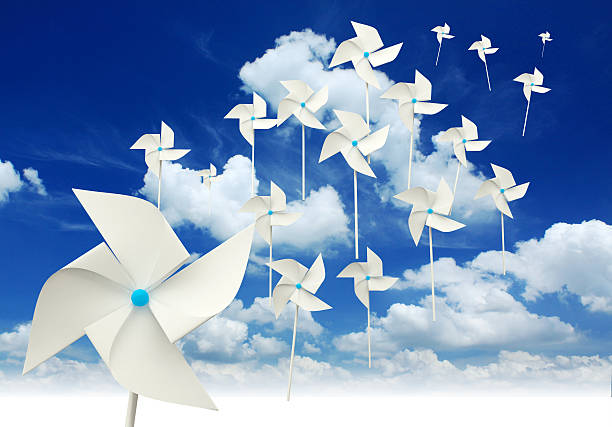 istock toy pinwheel on blue sky background 178562481