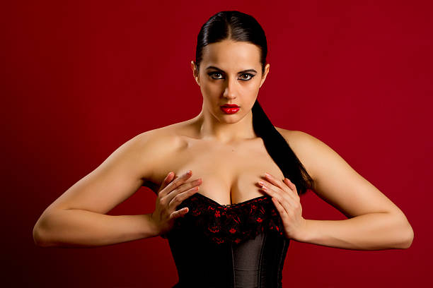 istock sexy young woman in black corset 178563586