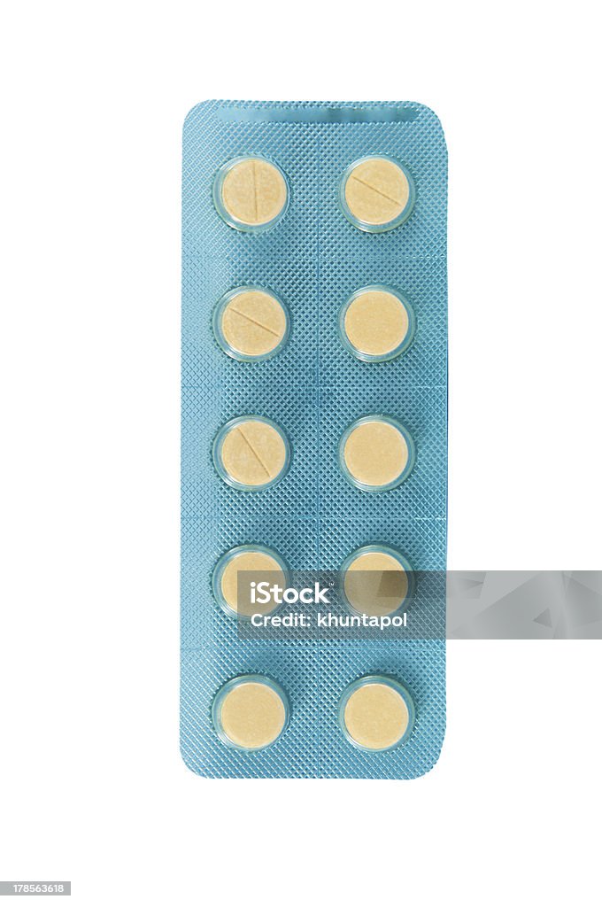 Yellow tablet in transparent blister pack Assistance Stock Photo