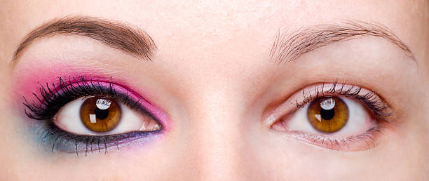 Woman with and without eye makeup