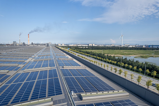 Photovoltaic solar power plant on the roof of the factory