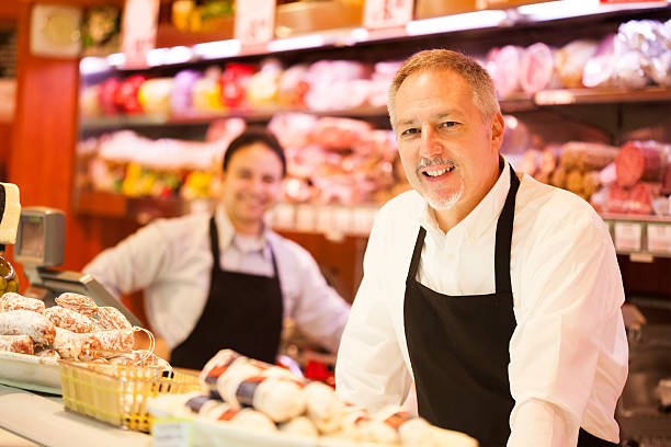 istock People working in a grocery store 178564460