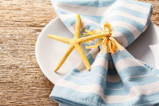 Summer theme table setting in white and blue colors