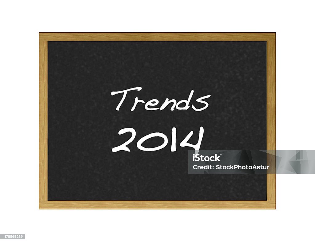 2014 trends. Isolated blackboard with 2014 trends on white background. 2014 Stock Photo