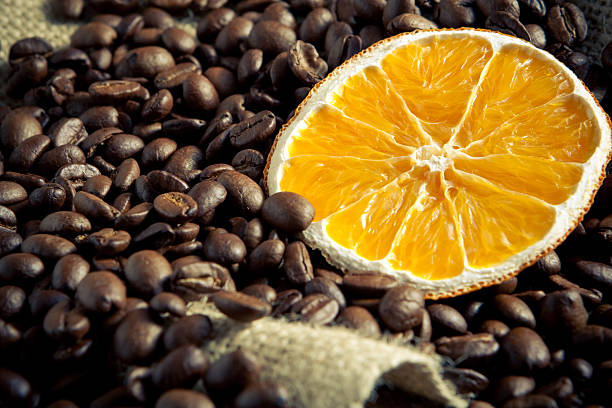 Coffee beans with orange stock photo