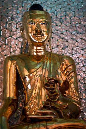 Statue of a gold Buddha in Burma/