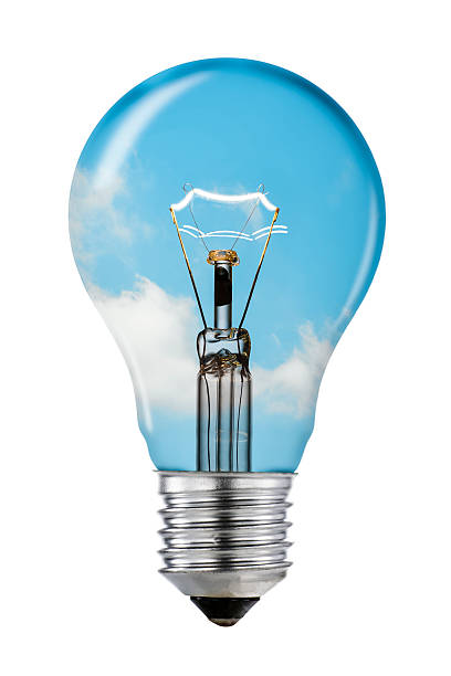 Blue Sky Thinking Lightbulb with Clipping Path "A clear light bulb switched on against a blue sky, isolated on white background, with a clipping path included. Creative thinking business ideas concept." big idea stock pictures, royalty-free photos & images