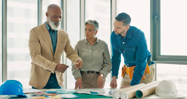istock Architecture people, teamwork and collaboration for color choice, brainstorming design and manager decision. Engineering, designer and group of people in meeting, project ideas or planning renovation 1785677850
