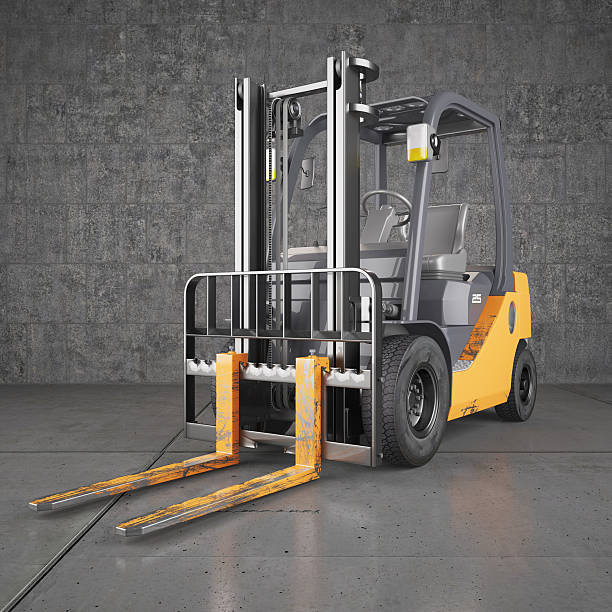 Forklift truck standing on industrial concrete wall background stock photo