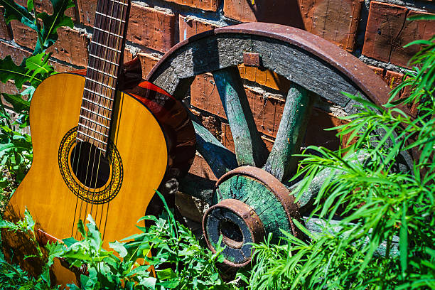 istock Guitar and the old wagon wheel 178568828
