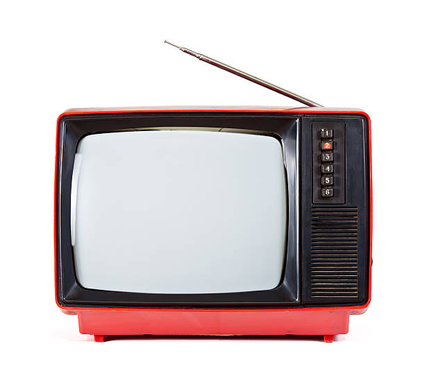 Red vintage portable TV set with antennae over white