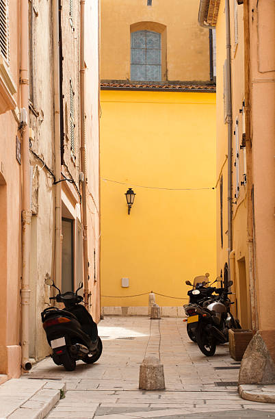 istock Scooters parked at the old buildings. 178570454
