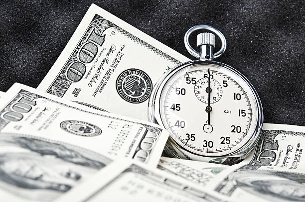 [stopwatch ](ストップウォッチ)は、ケース - finance photography us currency stopwatch ストックフォトと画像