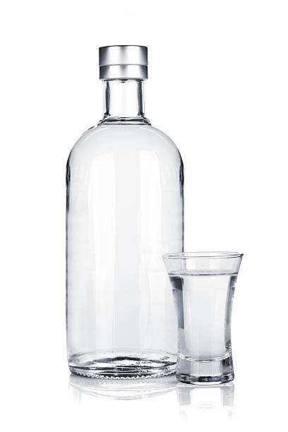 istock Bottle of vodka and shot glass 178570621