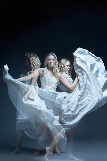 istock Dancing girl in wedding dress with multiexposition 178570681