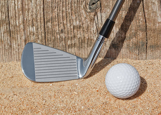 istock Golf stick and ball support wooden close-up on the sand. 178571877