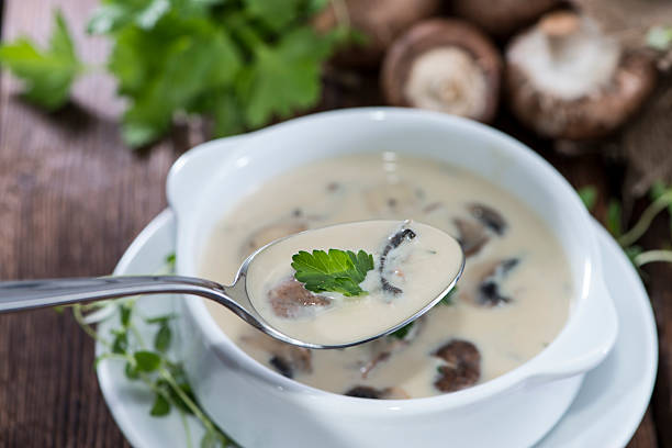 Creamy Mushroom Soup Creamy Mushroom Soup with fresh herbs cream soup stock pictures, royalty-free photos & images