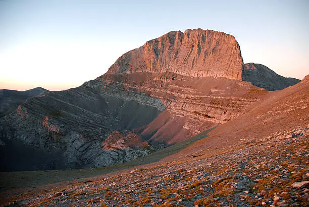 Stefani peak on mount Olympus during orange sunrise