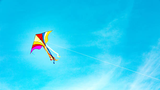 istock Colorful kite flying freely in the wind 1785723285
