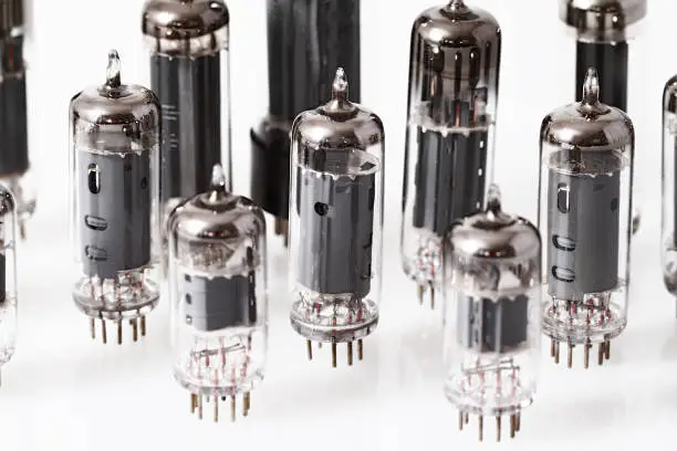 Glass vacuum radio tubes.  Isolated image on white background