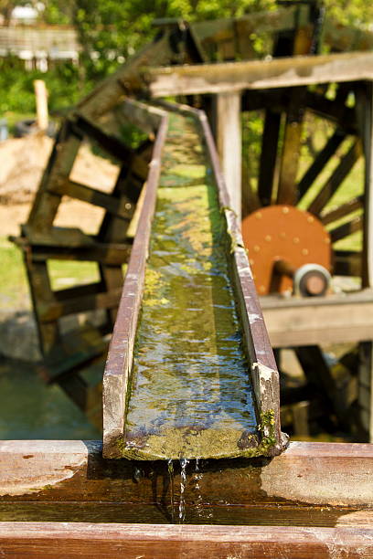 istock wooden waterwheel 178573132