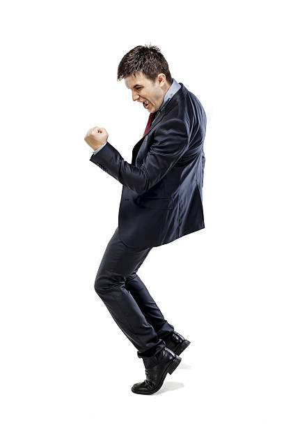 istock young attractive business man in black suite on white background 178573371
