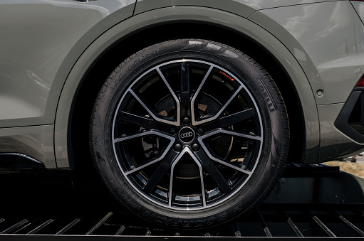 Minsk, Belarus, November 10, 2023 - Car exterior details. Audi tyre and alloy wheel.