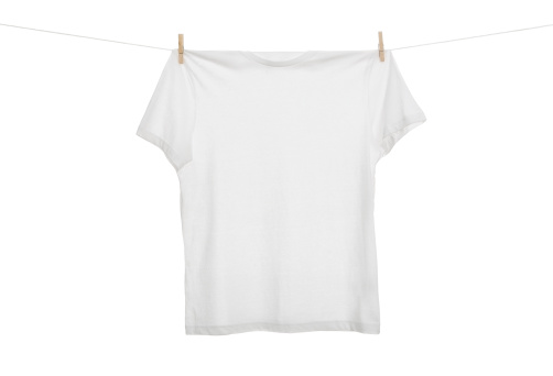 Blank t shirt hanging on the clothes line isolated on white background with copy space