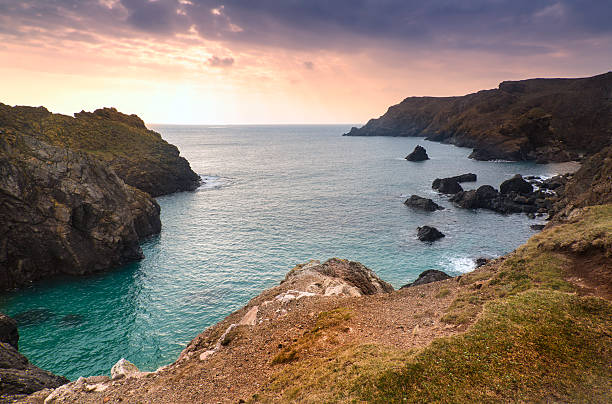 istock Spring sunset landscape at high tide Kynance Cove 178573816