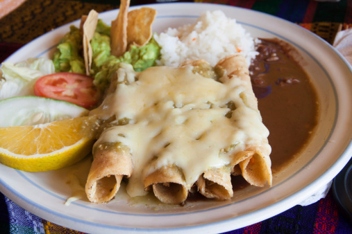 A dish of mexican enchiladas