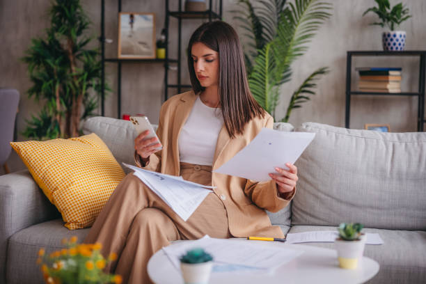 istock Woman paying her bills 1785768530