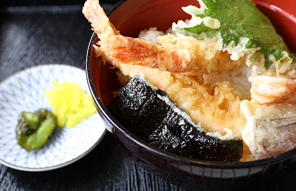 istock Deep fried shrimp called Tempura on top of japanese rice 178576871