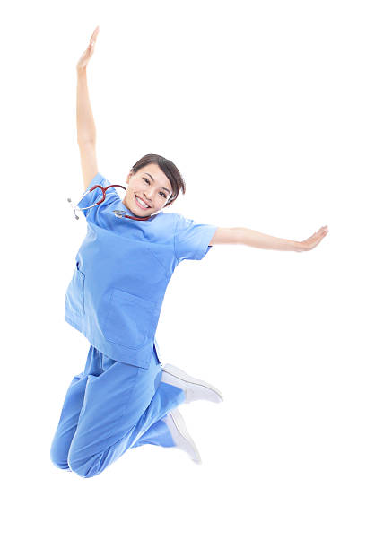 istock Excited female doctor jumping high 178576953